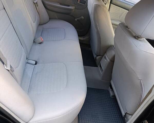 Чорний Кіа Черато, об'ємом двигуна 1.6 л та пробігом 237 тис. км за 5300 $, фото 20 на Automoto.ua