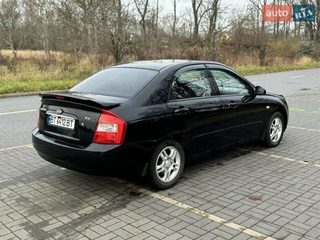 Чорний Кіа Черато, об'ємом двигуна 1.98 л та пробігом 177 тис. км за 3950 $, фото 8 на Automoto.ua