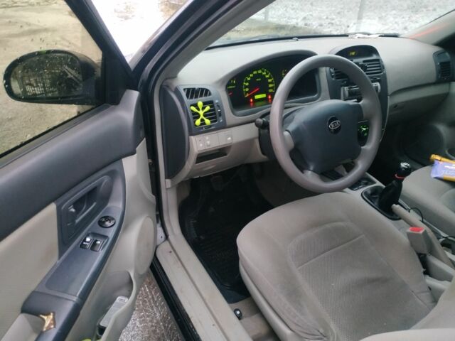 Черный Киа Черато, объемом двигателя 0 л и пробегом 210 тыс. км за 2500 $, фото 7 на Automoto.ua