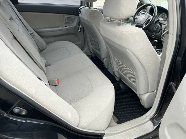 Черный Киа Черато, объемом двигателя 1.6 л и пробегом 230 тыс. км за 3200 $, фото 15 на Automoto.ua