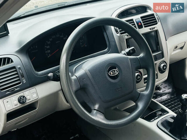 Чорний Кіа Черато, об'ємом двигуна 2 л та пробігом 319 тис. км за 4300 $, фото 9 на Automoto.ua