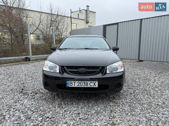 Черный Киа Черато, объемом двигателя 1.6 л и пробегом 220 тыс. км за 3300 $, фото 1 на Automoto.ua