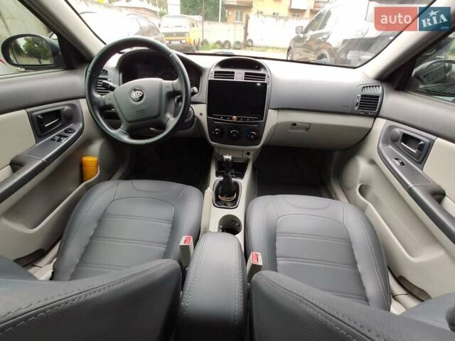 Черный Киа Черато, объемом двигателя 1.59 л и пробегом 203 тыс. км за 4400 $, фото 7 на Automoto.ua