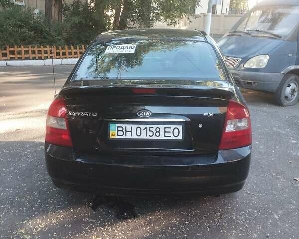 Черный Киа Черато, объемом двигателя 2 л и пробегом 220 тыс. км за 4900 $, фото 8 на Automoto.ua