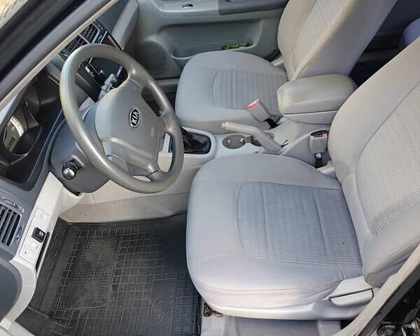 Чорний Кіа Черато, об'ємом двигуна 1.6 л та пробігом 237 тис. км за 5300 $, фото 26 на Automoto.ua