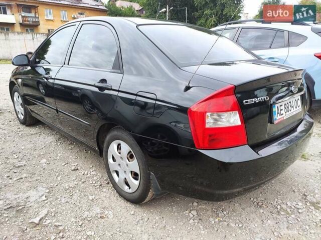 Черный Киа Черато, объемом двигателя 1.59 л и пробегом 203 тыс. км за 4400 $, фото 5 на Automoto.ua