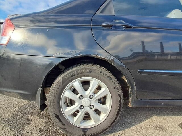 Черный Киа Черато, объемом двигателя 1.6 л и пробегом 258 тыс. км за 4300 $, фото 3 на Automoto.ua