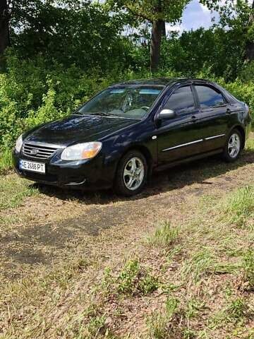 Черный Киа Черато, объемом двигателя 1.59 л и пробегом 273 тыс. км за 4200 $, фото 1 на Automoto.ua