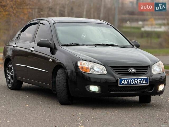 Чорний Кіа Черато, об'ємом двигуна 1.6 л та пробігом 224 тис. км за 4900 $, фото 3 на Automoto.ua