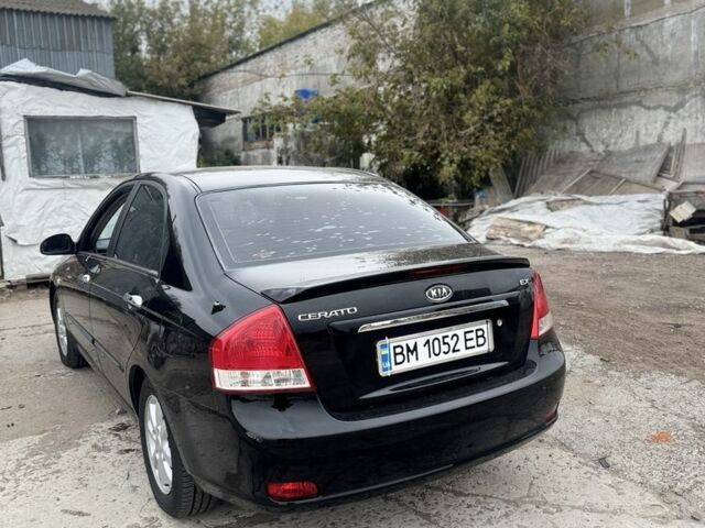Черный Киа Черато, объемом двигателя 1.6 л и пробегом 126 тыс. км за 5200 $, фото 2 на Automoto.ua