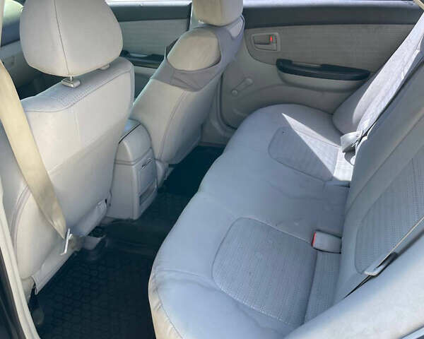 Черный Киа Черато, объемом двигателя 1.59 л и пробегом 210 тыс. км за 4100 $, фото 15 на Automoto.ua