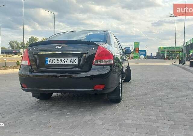 Черный Киа Черато, объемом двигателя 1.98 л и пробегом 268 тыс. км за 5200 $, фото 7 на Automoto.ua
