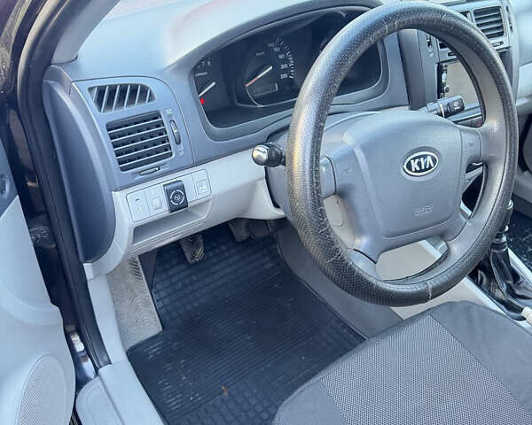 Чорний Кіа Черато, об'ємом двигуна 1.59 л та пробігом 250 тис. км за 4300 $, фото 17 на Automoto.ua