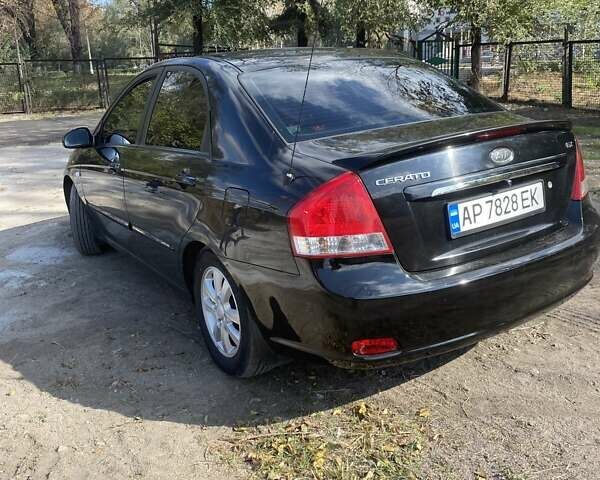 Чорний Кіа Черато, об'ємом двигуна 1.6 л та пробігом 157 тис. км за 5800 $, фото 4 на Automoto.ua