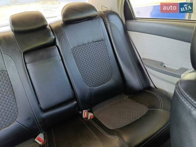 Черный Киа Черато, объемом двигателя 1.59 л и пробегом 219 тыс. км за 4600 $, фото 53 на Automoto.ua