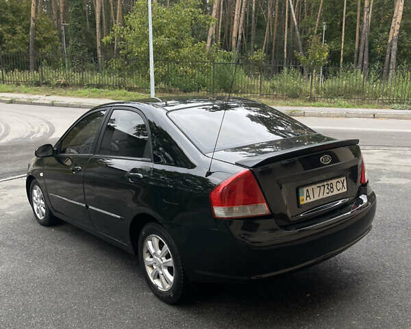 Черный Киа Черато, объемом двигателя 1.6 л и пробегом 211 тыс. км за 3200 $, фото 2 на Automoto.ua