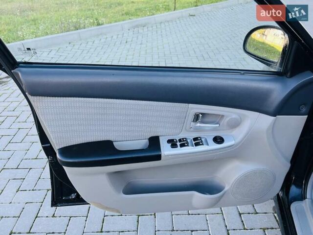 Черный Киа Черато, объемом двигателя 1.6 л и пробегом 210 тыс. км за 3650 $, фото 30 на Automoto.ua