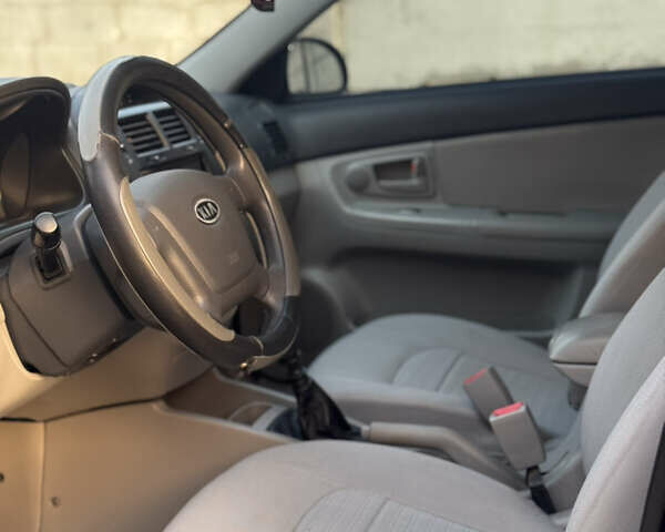 Черный Киа Черато, объемом двигателя 1.6 л и пробегом 235 тыс. км за 4900 $, фото 7 на Automoto.ua