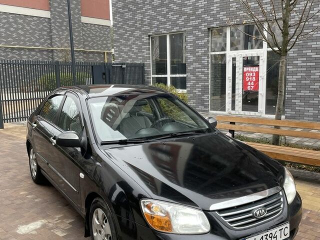Черный Киа Черато, объемом двигателя 1.6 л и пробегом 256 тыс. км за 4200 $, фото 2 на Automoto.ua
