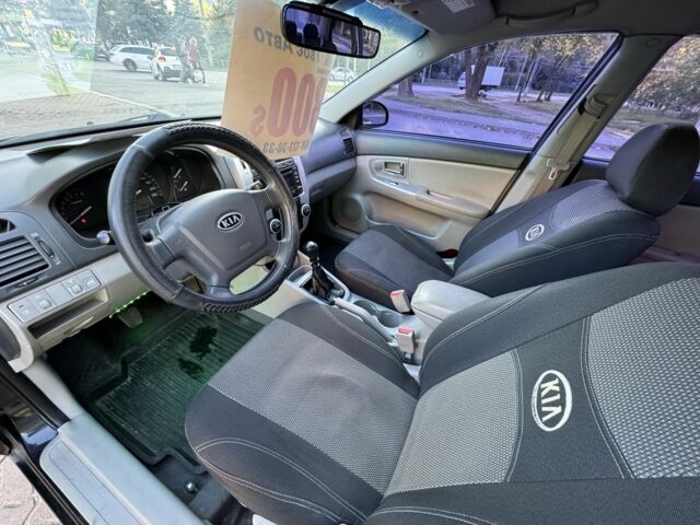 Киа Черато 2007 в Кривом Роге на Automoto.ua Черный Киа Черато, объемом двигателя 1.6 л и пробегом 174 тыс. км за 4550 $, фото 8 на Automoto.ua