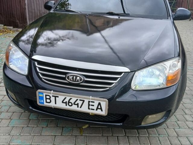Черный Киа Черато, объемом двигателя 2 л и пробегом 250 тыс. км за 3700 $, фото 2 на Automoto.ua