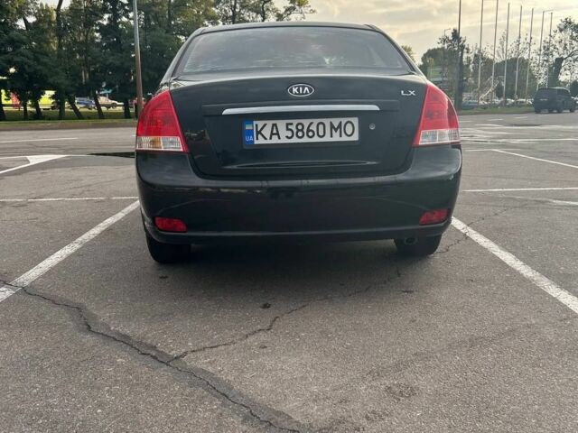 Черный Киа Черато, объемом двигателя 1.6 л и пробегом 292 тыс. км за 4000 $, фото 3 на Automoto.ua