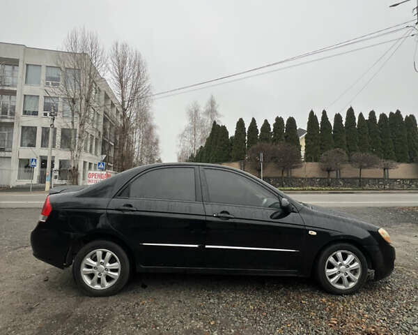 Черный Киа Черато, объемом двигателя 1.59 л и пробегом 273 тыс. км за 2999 $, фото 2 на Automoto.ua