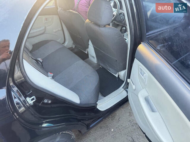 Чорний Кіа Черато, об'ємом двигуна 1.59 л та пробігом 250 тис. км за 4300 $, фото 9 на Automoto.ua