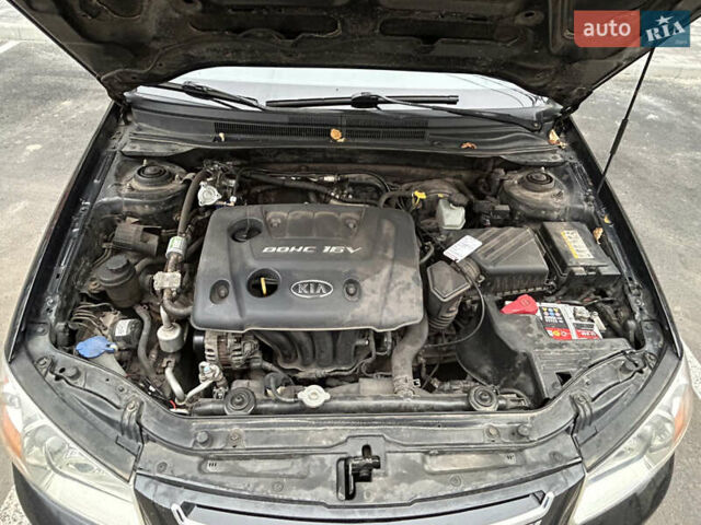 Черный Киа Черато, объемом двигателя 1.6 л и пробегом 206 тыс. км за 4500 $, фото 5 на Automoto.ua