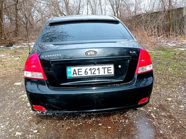 Чорний Кіа Черато, об'ємом двигуна 1.6 л та пробігом 215 тис. км за 3900 $, фото 3 на Automoto.ua