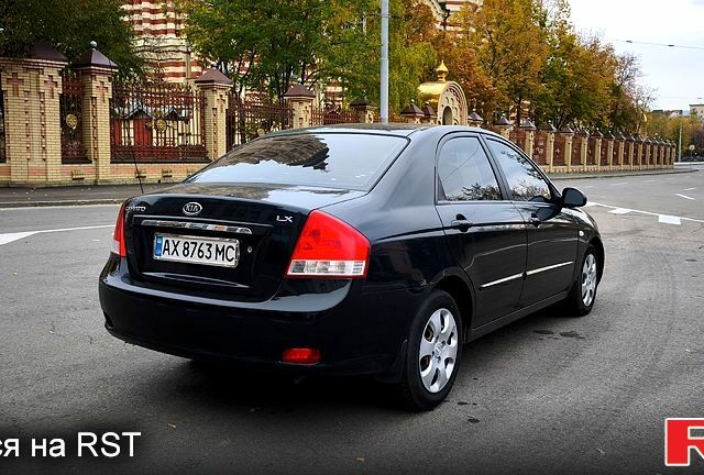 Черный Киа Черато, объемом двигателя 1.6 л и пробегом 204 тыс. км за 3700 $, фото 2 на Automoto.ua