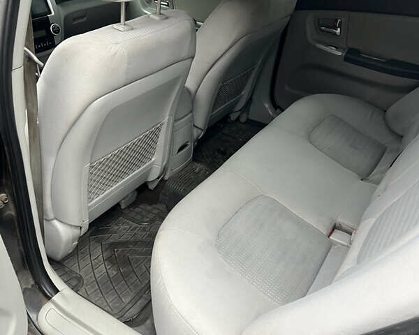 Черный Киа Черато, объемом двигателя 1.58 л и пробегом 355 тыс. км за 3500 $, фото 14 на Automoto.ua