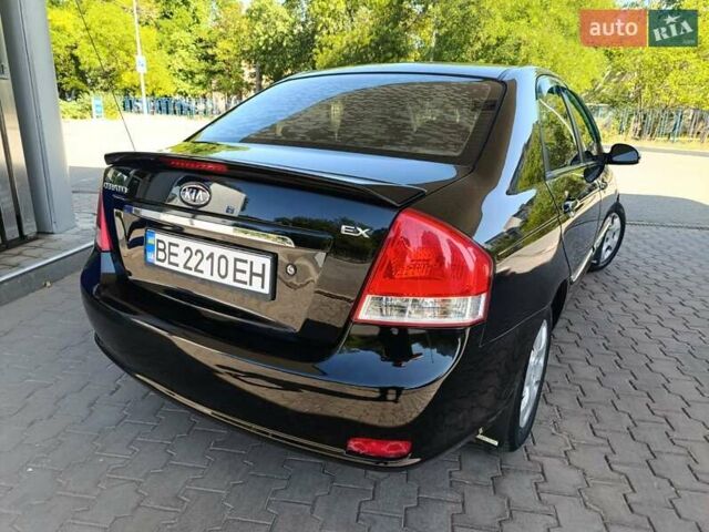 Чорний Кіа Черато, об'ємом двигуна 1.59 л та пробігом 219 тис. км за 4600 $, фото 12 на Automoto.ua