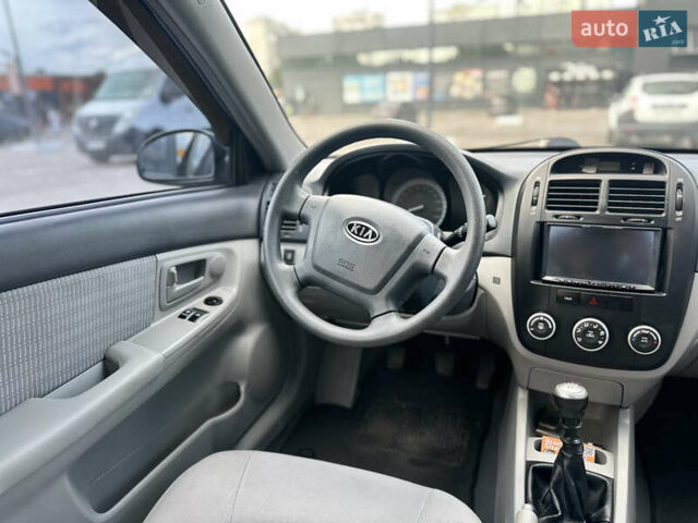 Чорний Кіа Черато, об'ємом двигуна 1.6 л та пробігом 272 тис. км за 5200 $, фото 12 на Automoto.ua