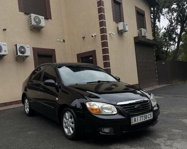 Черный Киа Черато, объемом двигателя 1.59 л и пробегом 273 тыс. км за 2999 $, фото 1 на Automoto.ua