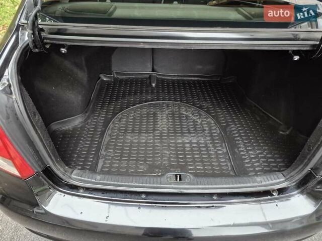 Черный Киа Черато, объемом двигателя 1.98 л и пробегом 180 тыс. км за 4500 $, фото 15 на Automoto.ua