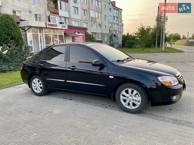 Чорний Кіа Черато, об'ємом двигуна 1.6 л та пробігом 111 тис. км за 4200 $, фото 1 на Automoto.ua