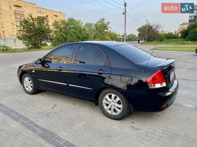Чорний Кіа Черато, об'ємом двигуна 1.6 л та пробігом 111 тис. км за 4200 $, фото 3 на Automoto.ua