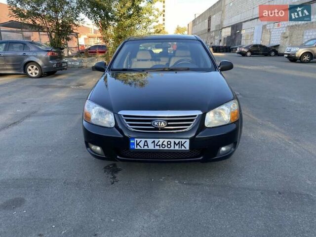 Черный Киа Черато, объемом двигателя 1.98 л и пробегом 335 тыс. км за 4100 $, фото 8 на Automoto.ua