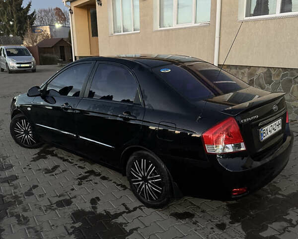 Чорний Кіа Черато, об'ємом двигуна 1.6 л та пробігом 197 тис. км за 5500 $, фото 4 на Automoto.ua