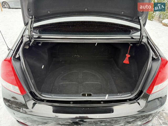 Черный Киа Черато, объемом двигателя 1.98 л и пробегом 183 тыс. км за 5999 $, фото 8 на Automoto.ua