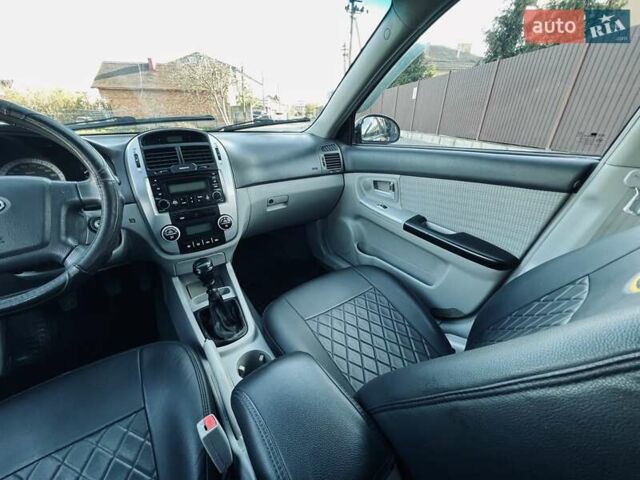 Киа Черато 2007 в Черновцах на Automoto.ua Черный Киа Черато, объемом двигателя 1.6 л и пробегом 210 тыс. км за 3950 $, фото 44 на Automoto.ua