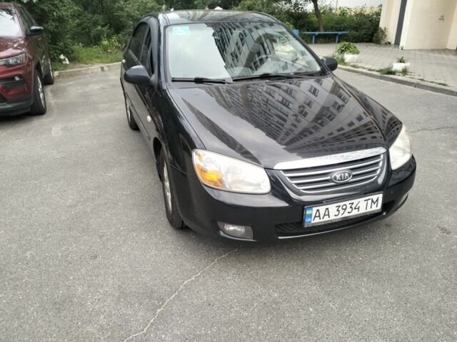 Чорний Кіа Черато, об'ємом двигуна 2 л та пробігом 246 тис. км за 4200 $, фото 2 на Automoto.ua