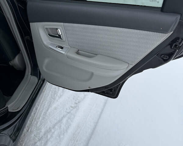 Черный Киа Черато, объемом двигателя 1.6 л и пробегом 230 тыс. км за 4649 $, фото 35 на Automoto.ua