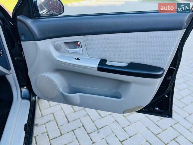Киа Черато 2007 в Черновцах на Automoto.ua Черный Киа Черато, объемом двигателя 1.6 л и пробегом 210 тыс. км за 3950 $, фото 41 на Automoto.ua