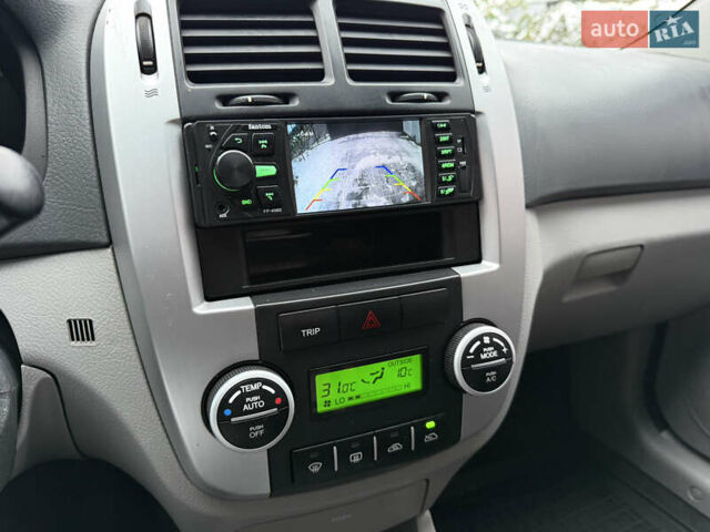 Черный Киа Черато, объемом двигателя 2 л и пробегом 183 тыс. км за 5999 $, фото 27 на Automoto.ua