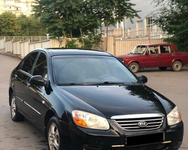Черный Киа Черато, объемом двигателя 1.59 л и пробегом 273 тыс. км за 4200 $, фото 2 на Automoto.ua