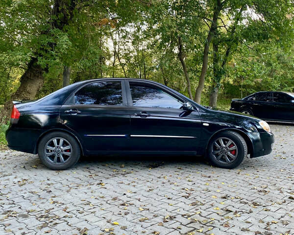 Чорний Кіа Черато, об'ємом двигуна 1.98 л та пробігом 302 тис. км за 4700 $, фото 4 на Automoto.ua