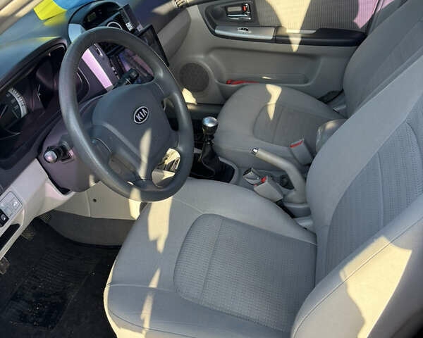 Черный Киа Черато, объемом двигателя 1.59 л и пробегом 314 тыс. км за 5000 $, фото 6 на Automoto.ua