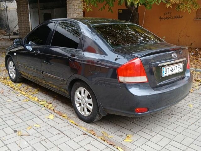 Черный Киа Черато, объемом двигателя 2 л и пробегом 250 тыс. км за 3700 $, фото 9 на Automoto.ua